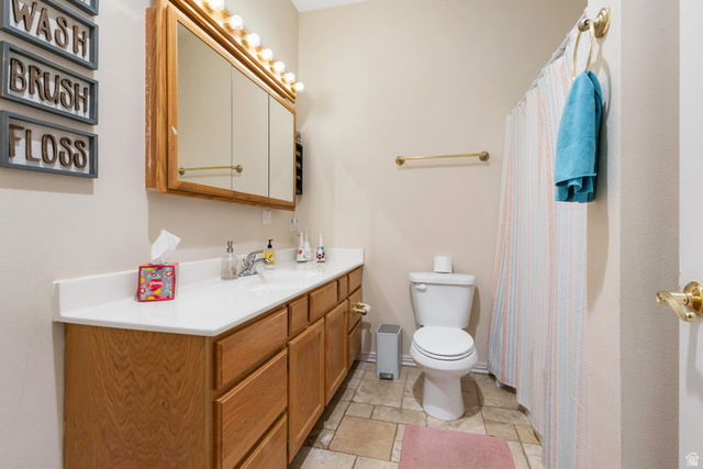 684 North Summit Way Alpine, UT 84004 - Photo 51 of 58 Full bath with vanity and a shower with shower curtain