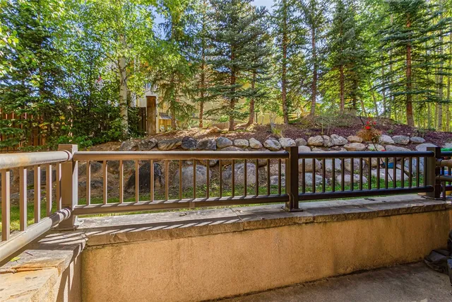 a view of a balcony with furniture