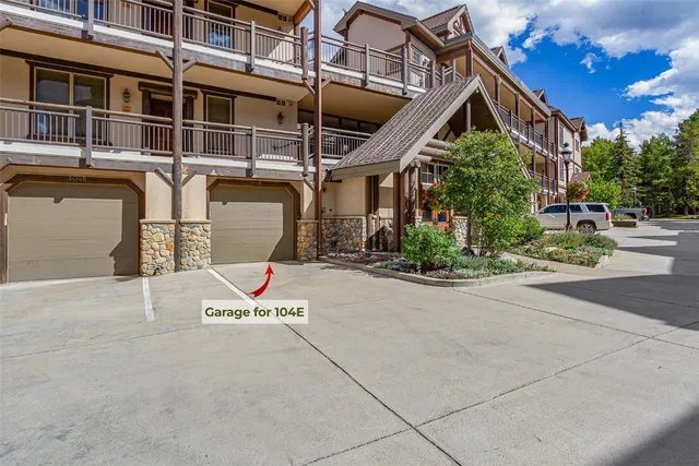 a view of a hallway with stairs