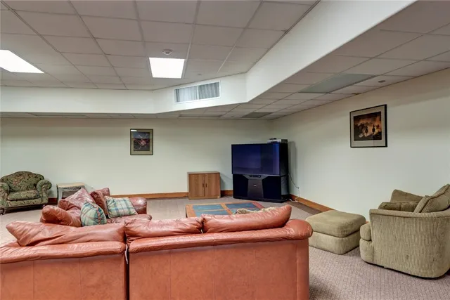 a living room with furniture and a table