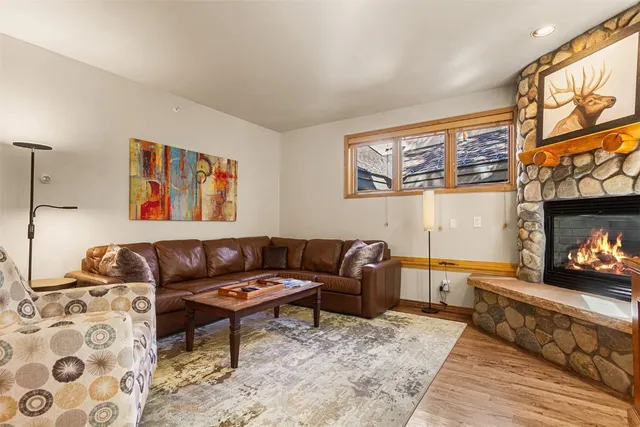 a kitchen with granite countertop a sink and cabinets