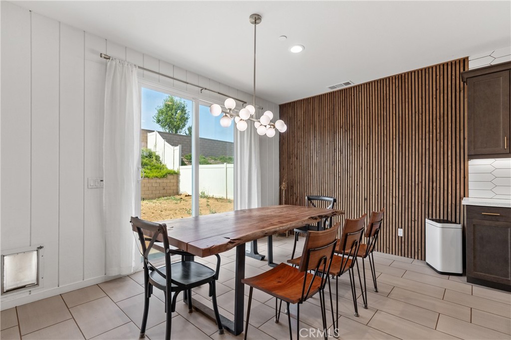 28341 Heather Grn Way Menifee, CA 92584 - Photo 8 of 44 Spacious eating area with slider door exit to backyard