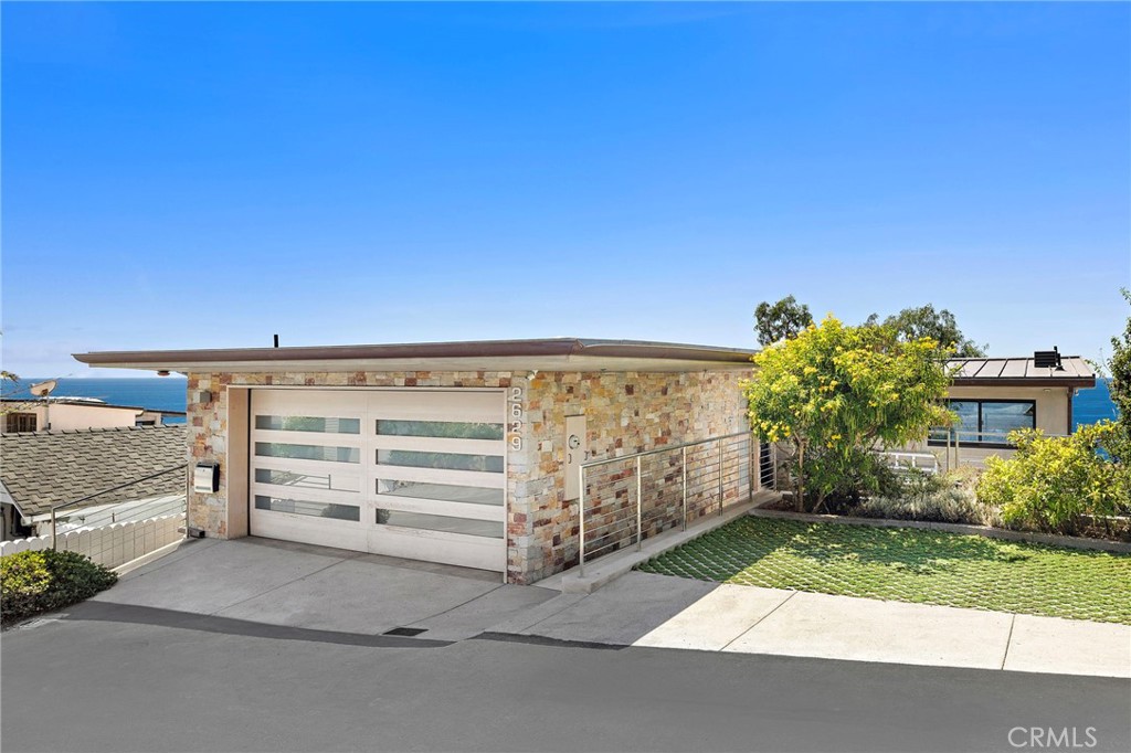 2629 Victoria Drive Laguna Beach, CA 92651 - Photo 2 of 35 a view of a house with a garage