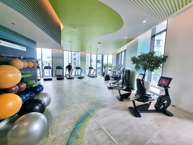 a view of a room with gym equipment