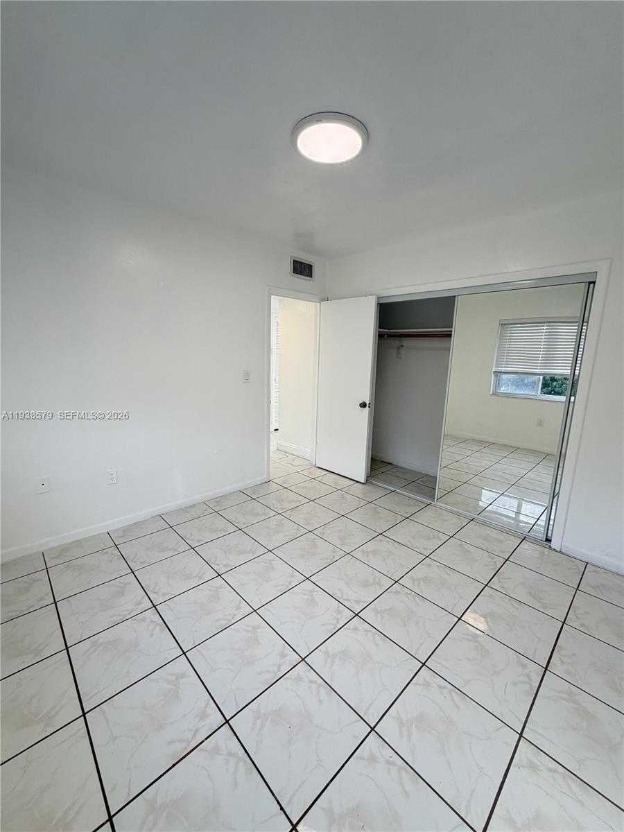 1860 Southwest 22nd Street, Unit 8 Miami, FL 33145 - Photo 7 of 10 a view of a room and utility room