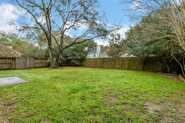 a view of a backyard with a garden