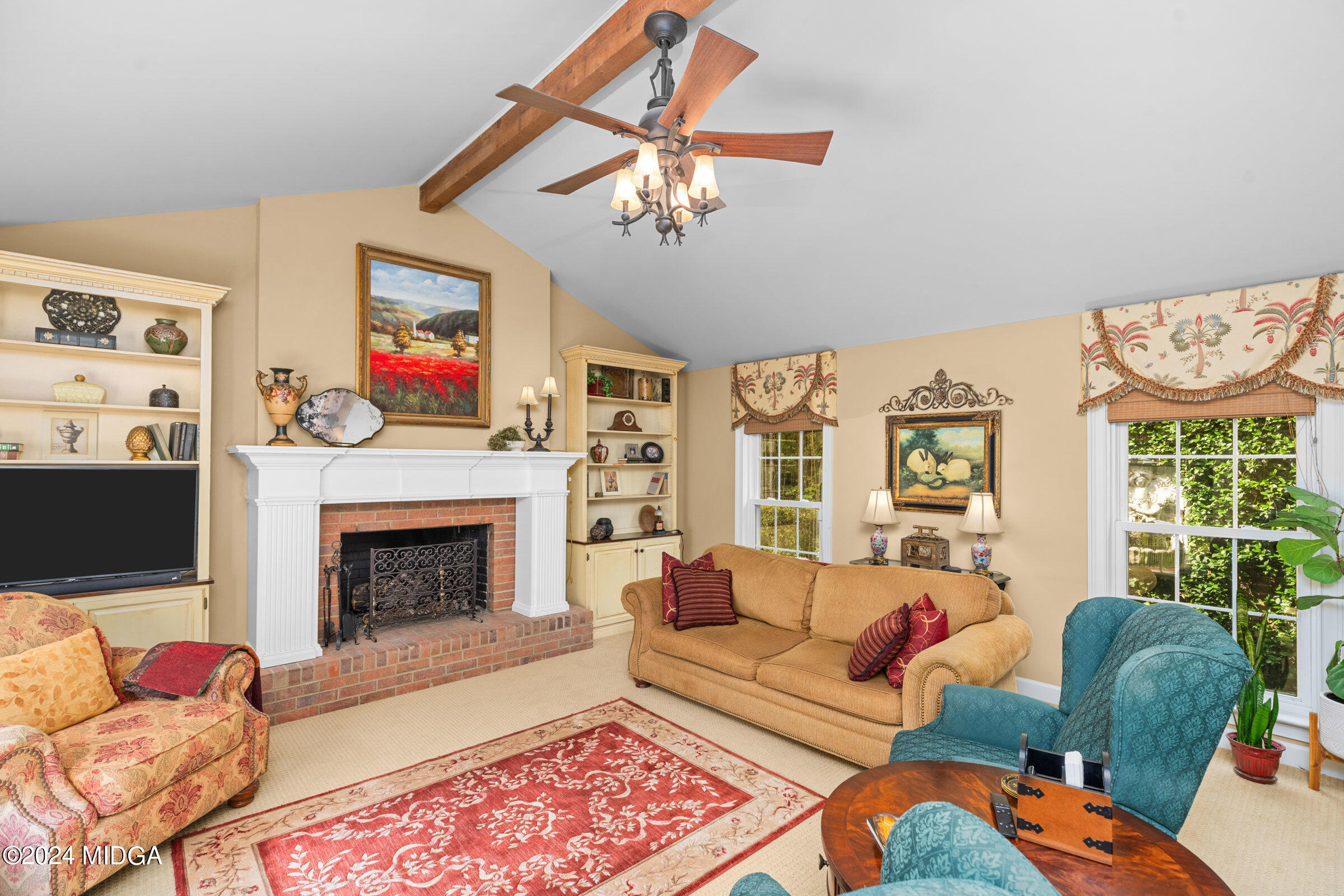 552 Plantation Road Gray, GA 31032 - Photo 11 of 38 a living room with furniture fireplace and window