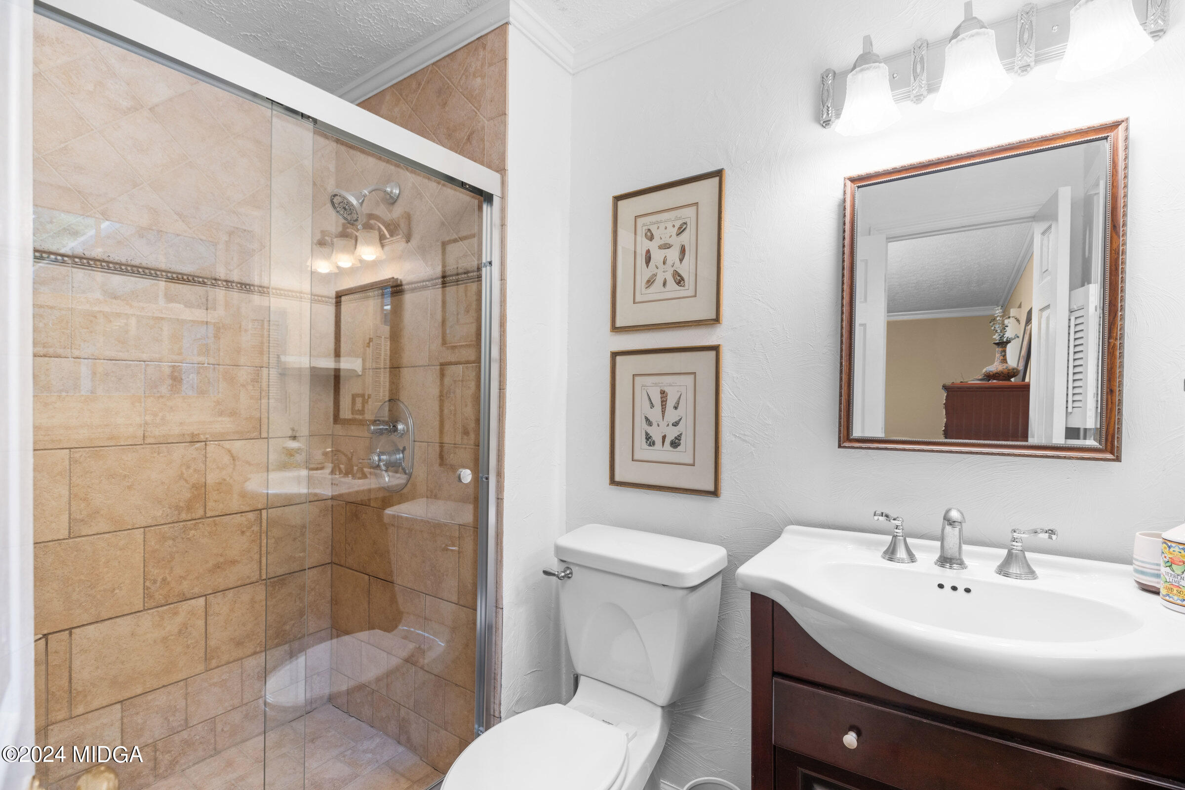 552 Plantation Road Gray, GA 31032 - Photo 22 of 38 a bathroom with a sink toilet and shower