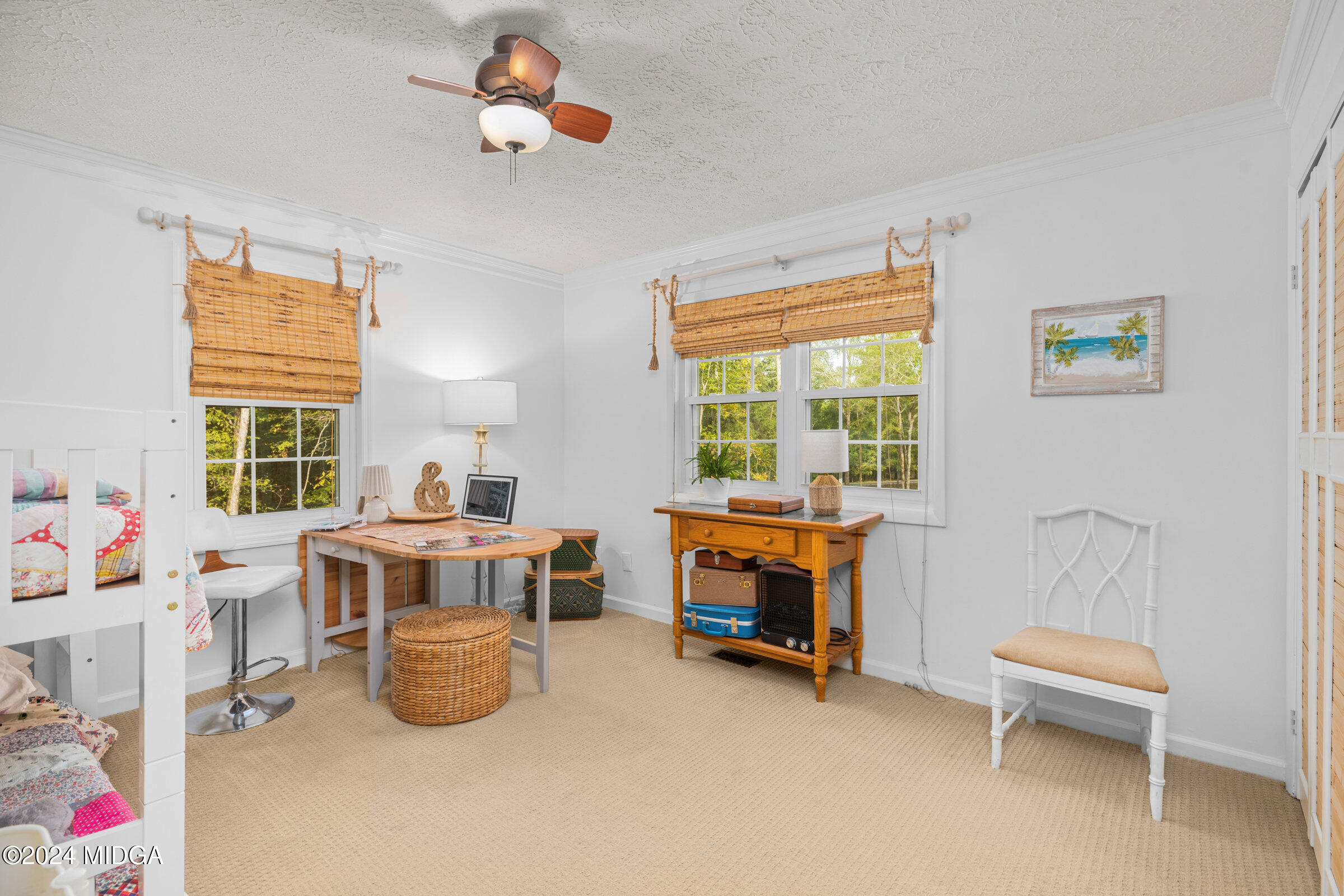 552 Plantation Road Gray, GA 31032 - Photo 25 of 38 a view of a workspace with furniture and a window