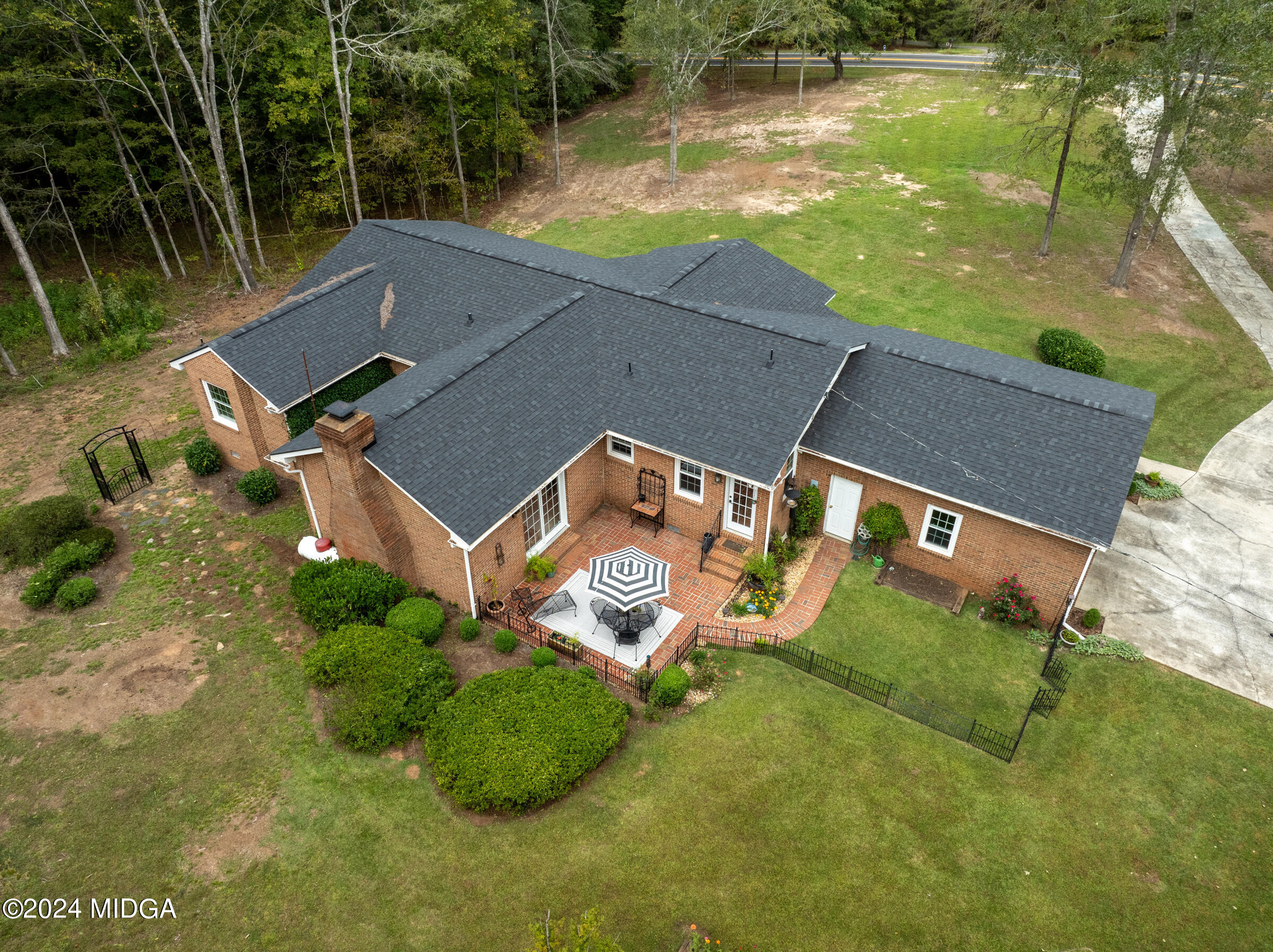 552 Plantation Road Gray, GA 31032 - Photo 35 of 38 an aerial view of a house with a yard basket ball court and trampoline