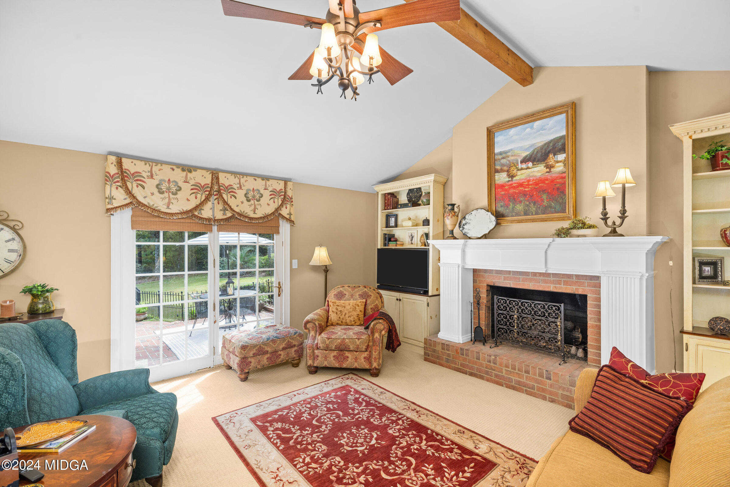 552 Plantation Road Gray, GA 31032 - Photo 10 of 38 a living room with furniture and a fireplace