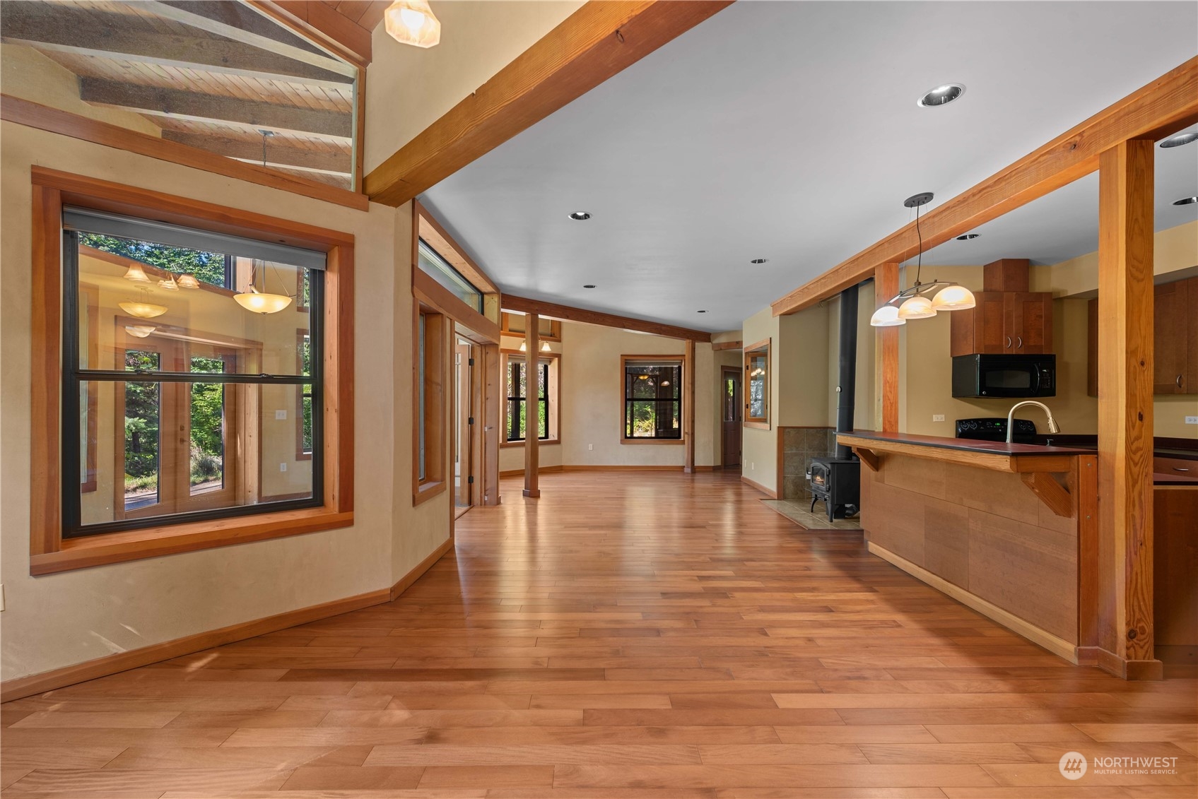 23510 White River Road Leavenworth, WA 98826 - Photo 17 of 39 a view of a big room with wooden floor and windows
