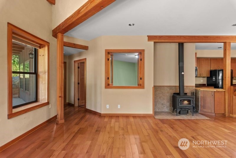 23510 White River Road Leavenworth, WA 98826 - Photo 24 of 39 wooden floor in an empty room with a window