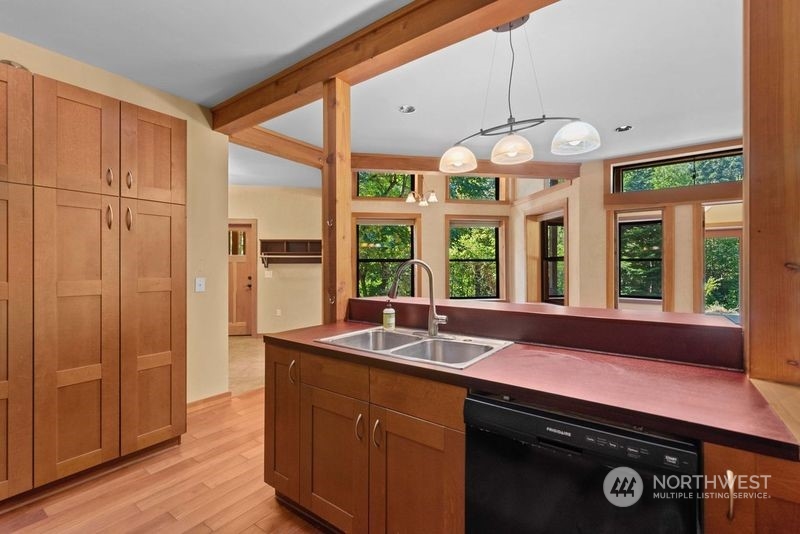 23510 White River Road Leavenworth, WA 98826 - Photo 28 of 39 a kitchen with a sink and a large window