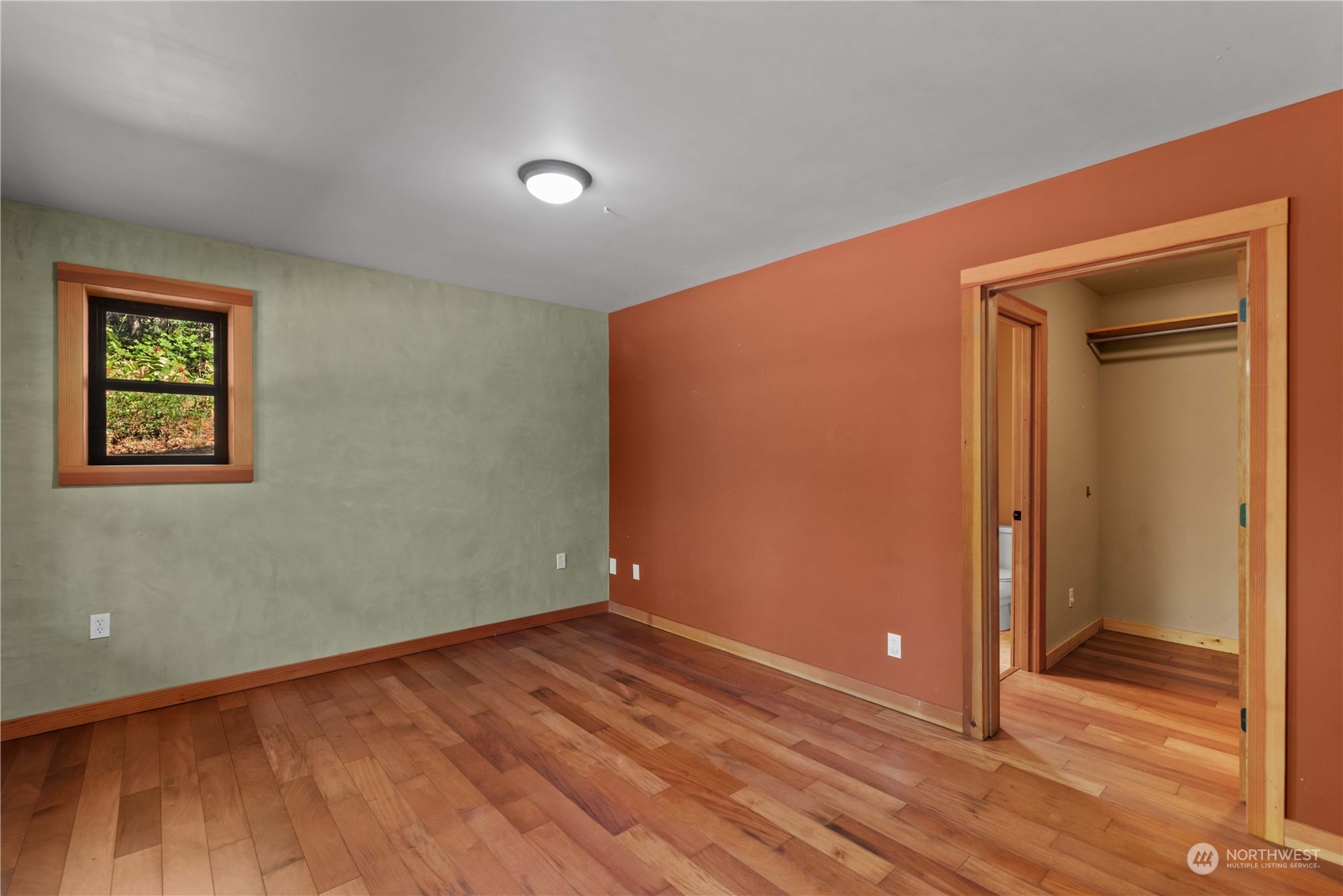 23510 White River Road Leavenworth, WA 98826 - Photo 32 of 39 an empty room with wooden floor and closet