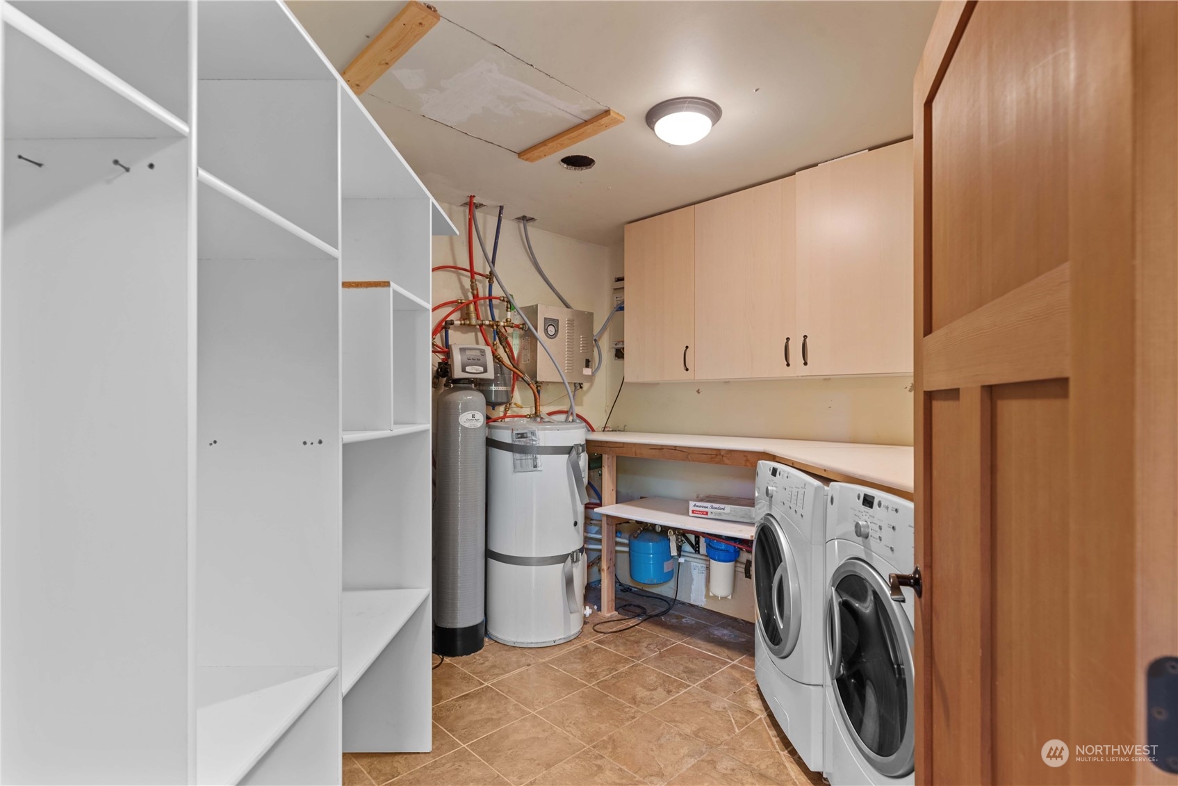 23510 White River Road Leavenworth, WA 98826 - Photo 38 of 39 a view of a storage & utility room with washer and dryer