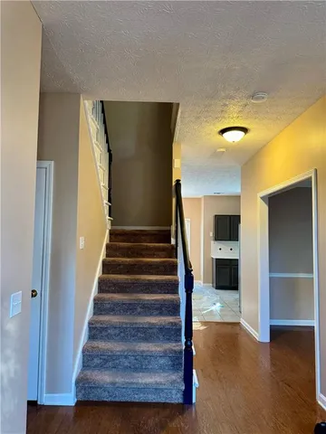 wooden floor with a balcony