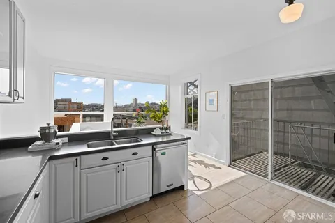 a bathroom with a toilet and a sink