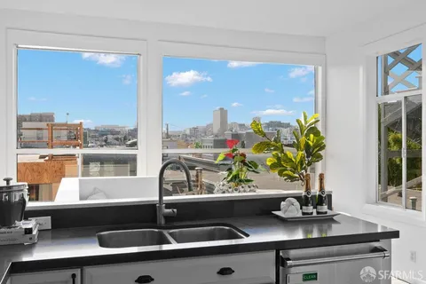 a bathroom with a tub and a sink