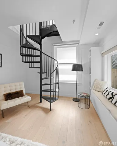 a front view of a house with parking