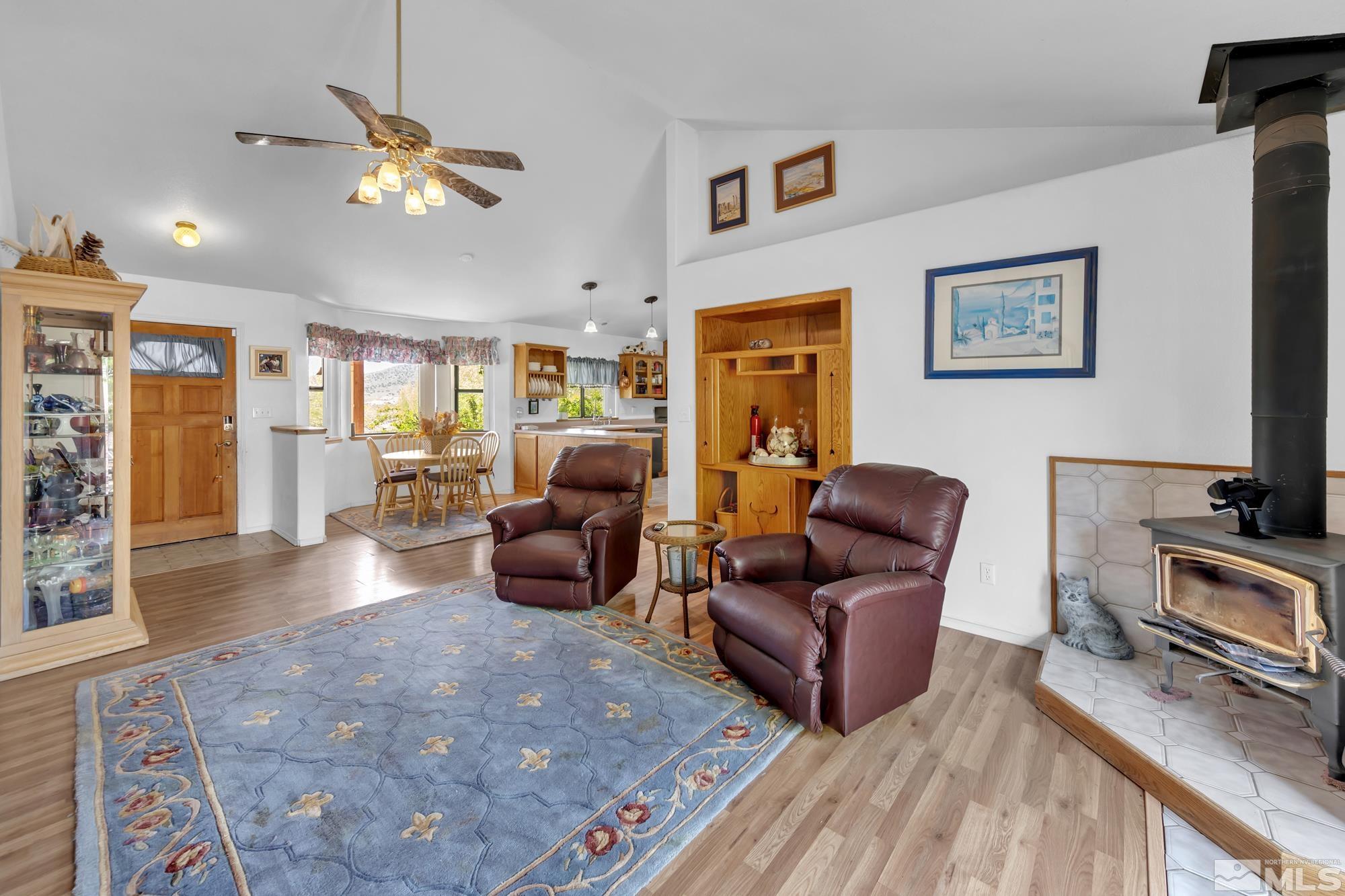 1340 Antelope Valley Road Reno, NV 89506 - Photo 6 of 40 a living room with furniture and a flat screen tv