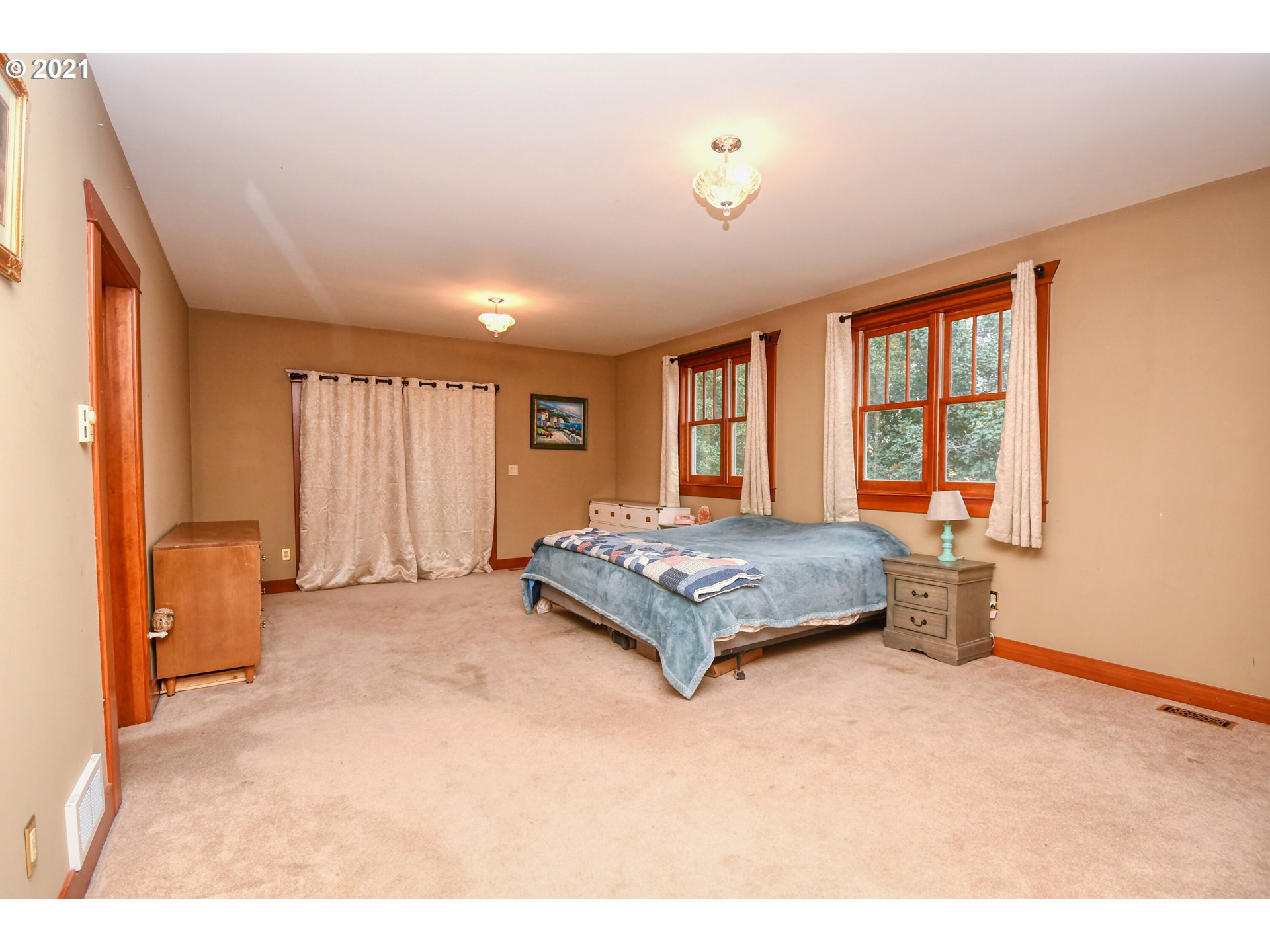 76223 Spring Hollow Road Adams, OR 97810 - Photo 17 of 30 a spacious bedroom with a bed and large windows