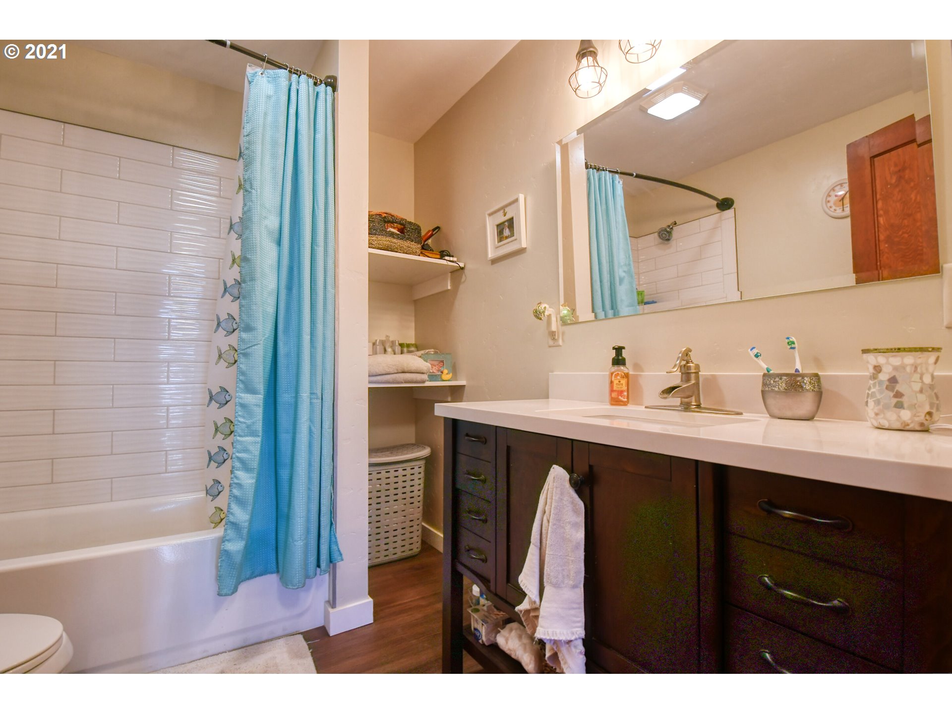 76223 Spring Hollow Road Adams, OR 97810 - Photo 22 of 30 a bathroom with a sink double vanity and a bathtub