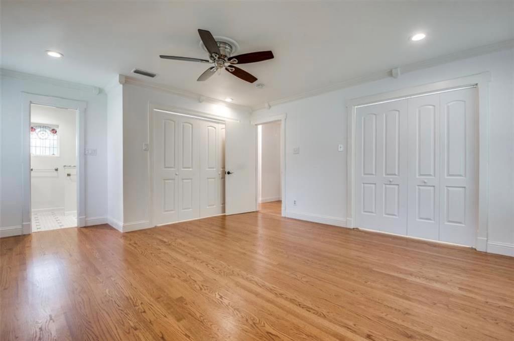 13038 Copenhill Road Dallas, TX 75240 - Photo 8 of 15 Hardwood flooring, recessed lighting, ceiling fan, and white bi-fold closet doors