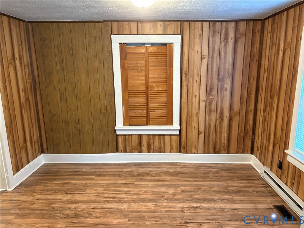 1904 Arlington Road Hopewell, VA 23860 - Photo 3 of 13 Unfurnished room featuring dark wood-style floorin