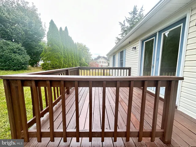 a view of a balcony with an outdoor space