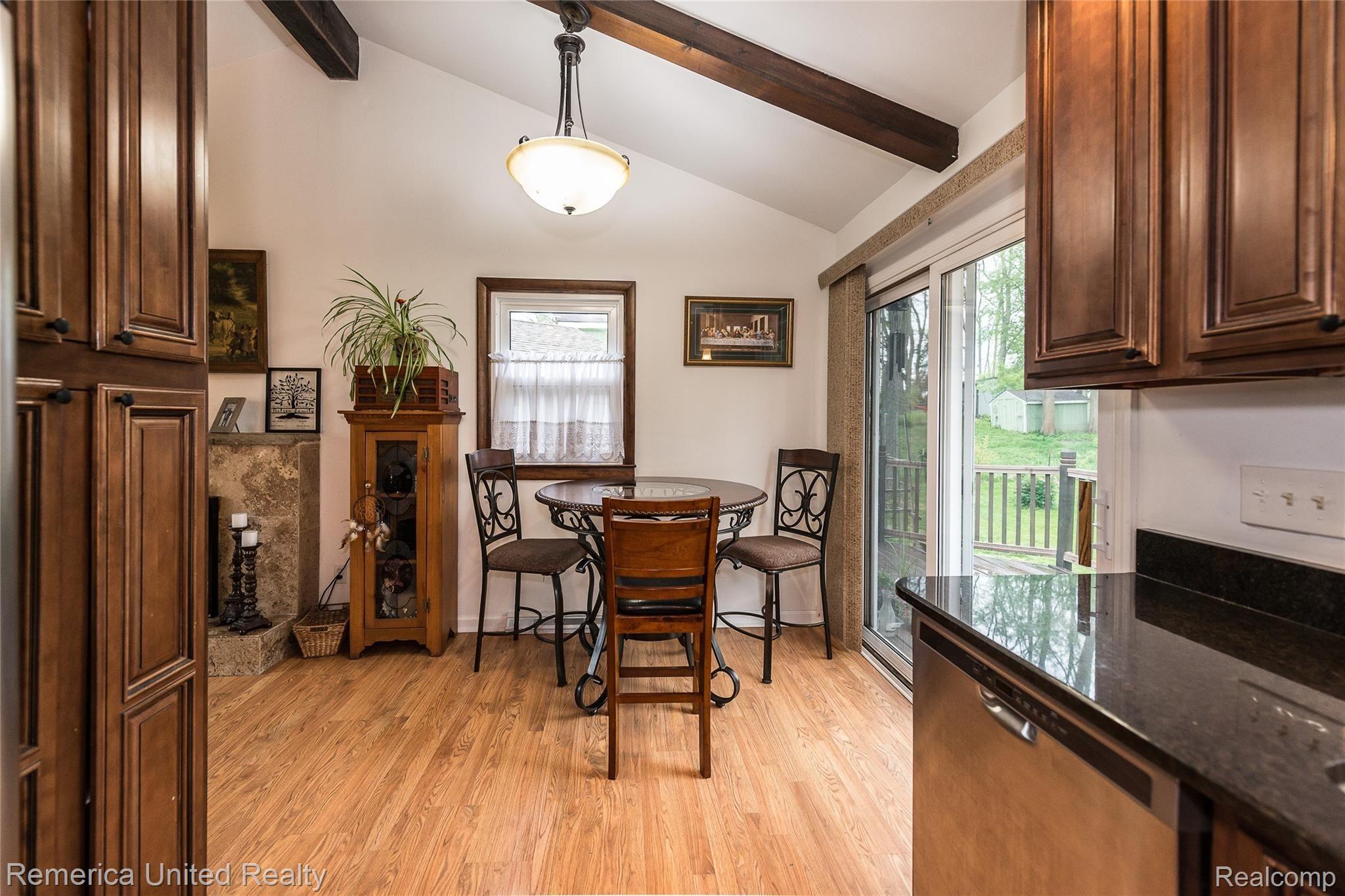 3447 Rush Lake Road Pinckney, MI 48169 - Photo 11 of 42 View From Kitchen into Dining Room