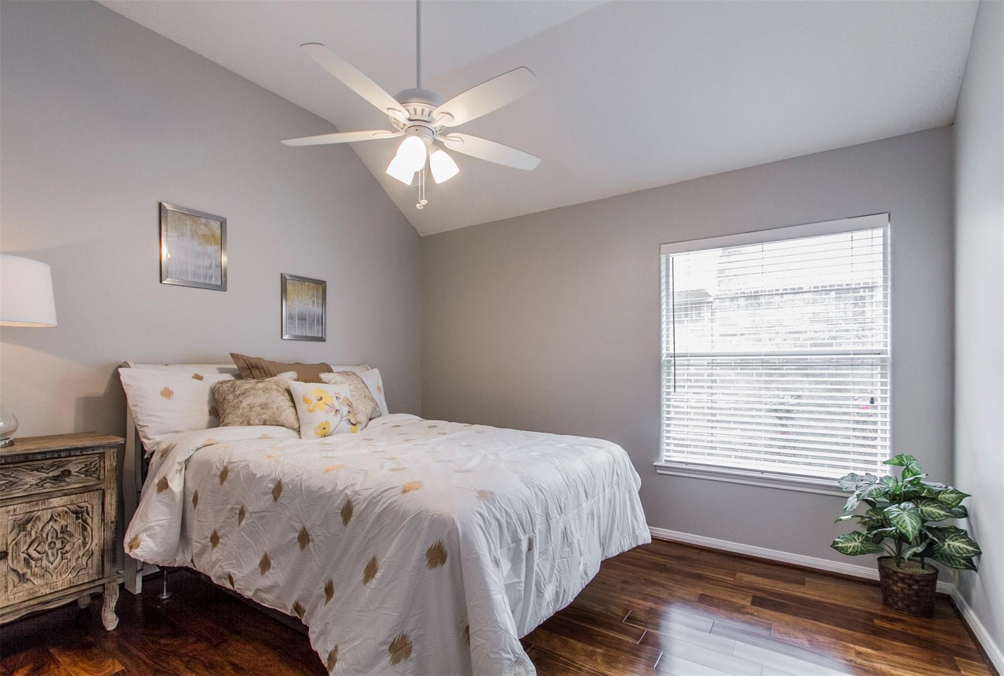 1230 Sienna Hill Drive Houston, TX 77077 - Photo 18 of 42 a bedroom with a large bed and a window