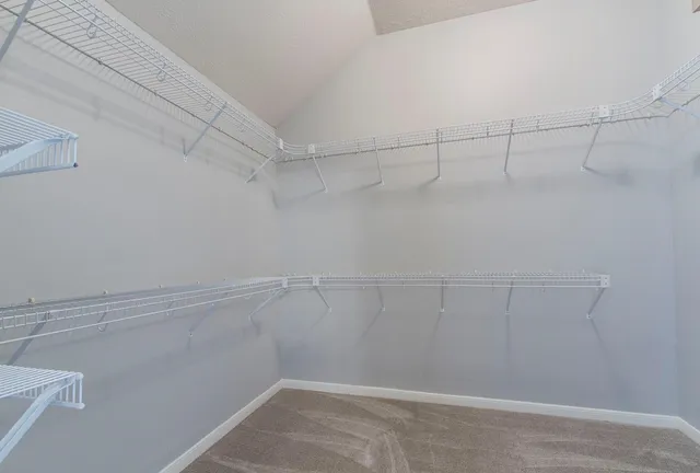 a view of a room with racks on the wall