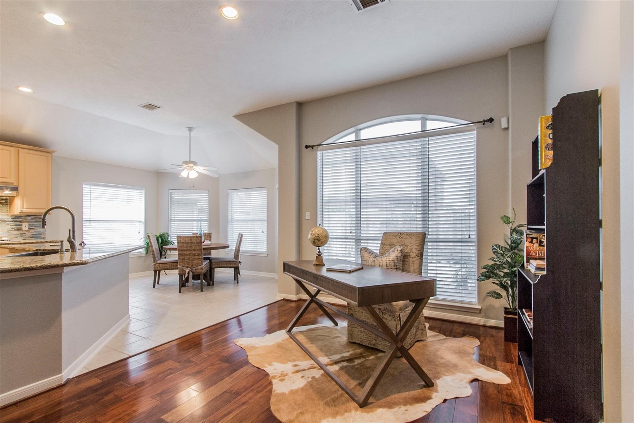 1230 Sienna Hill Drive Houston, TX 77077 - Photo 3 of 42 a workspace filed with furniture window and wooden floor