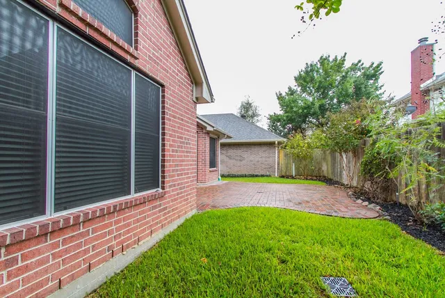 a view of a backyard with a garden