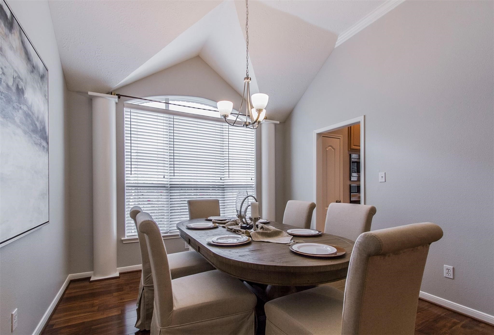 1230 Sienna Hill Drive Houston, TX 77077 - Photo 9 of 42 a view of a dining room with furniture and window