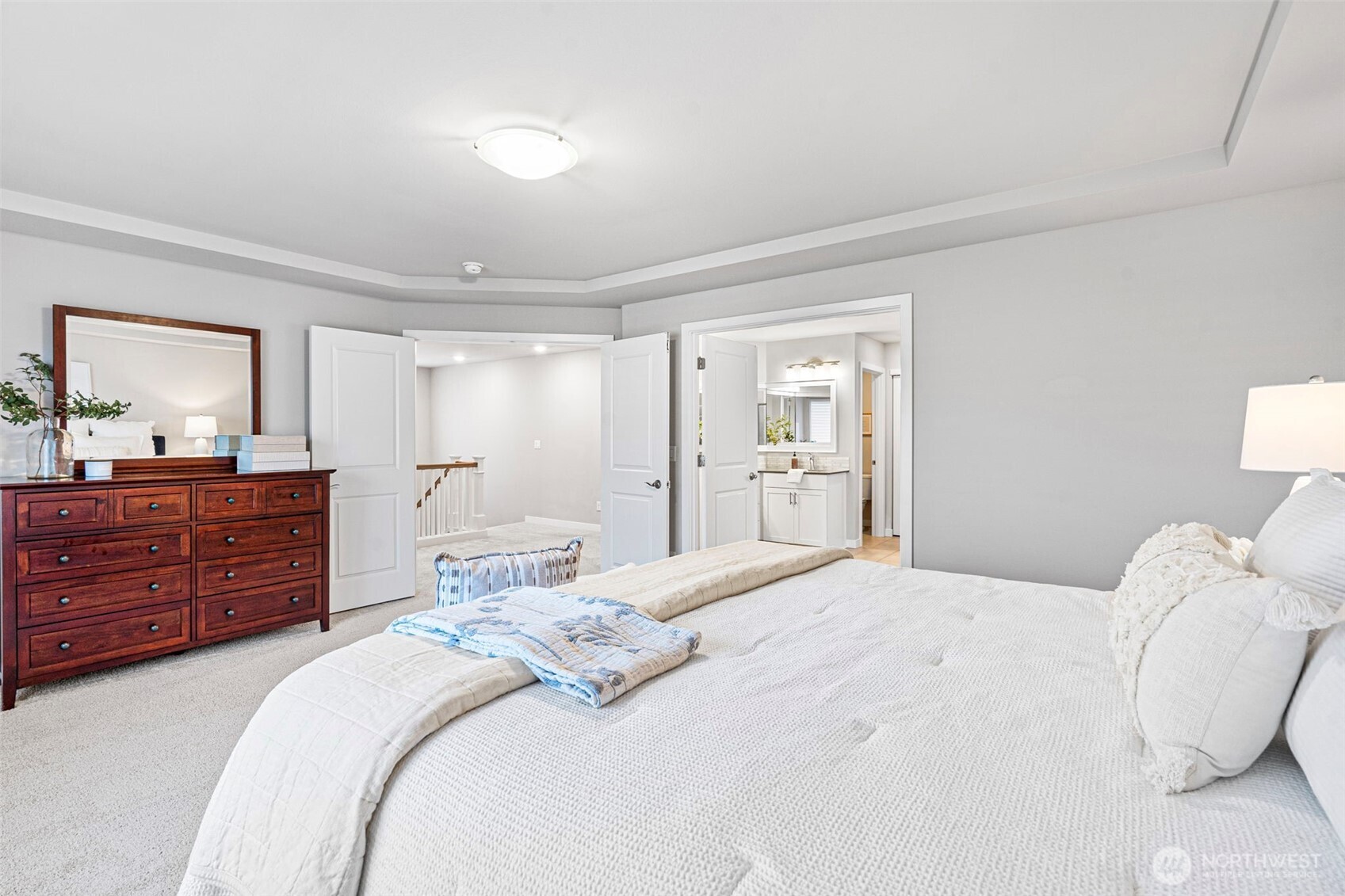 4526 Olympus Loop Gig Harbor, WA 98332 - Photo 18 of 38 a bedroom with a bed and a dresser