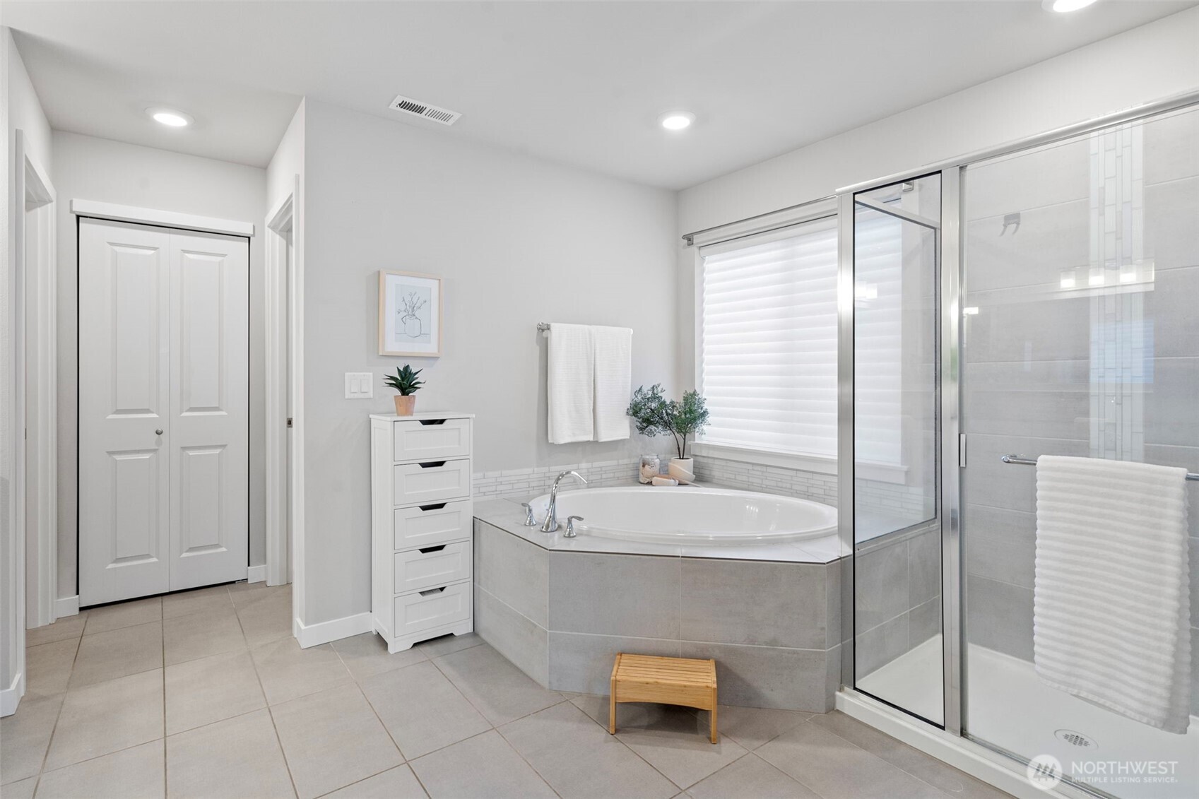 4526 Olympus Loop Gig Harbor, WA 98332 - Photo 19 of 38 a spacious bathroom with a tub shower and sink