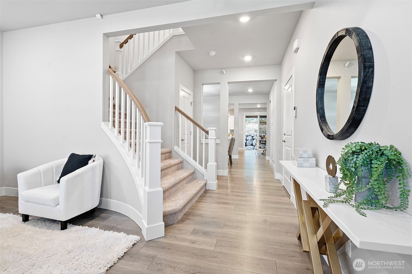 4526 Olympus Loop Gig Harbor, WA 98332 - Photo 2 of 38 a view of entryway and hall with wooden floor