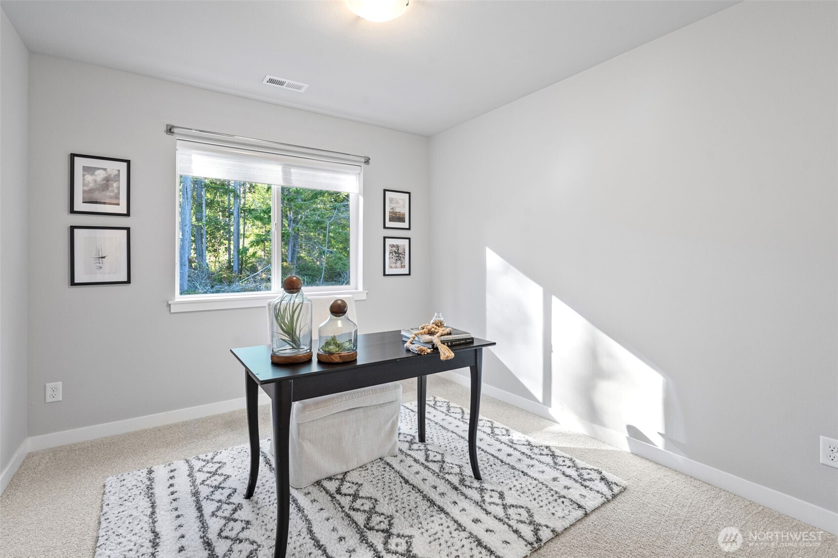 4526 Olympus Loop Gig Harbor, WA 98332 - Photo 23 of 38 a living room with furniture and a window