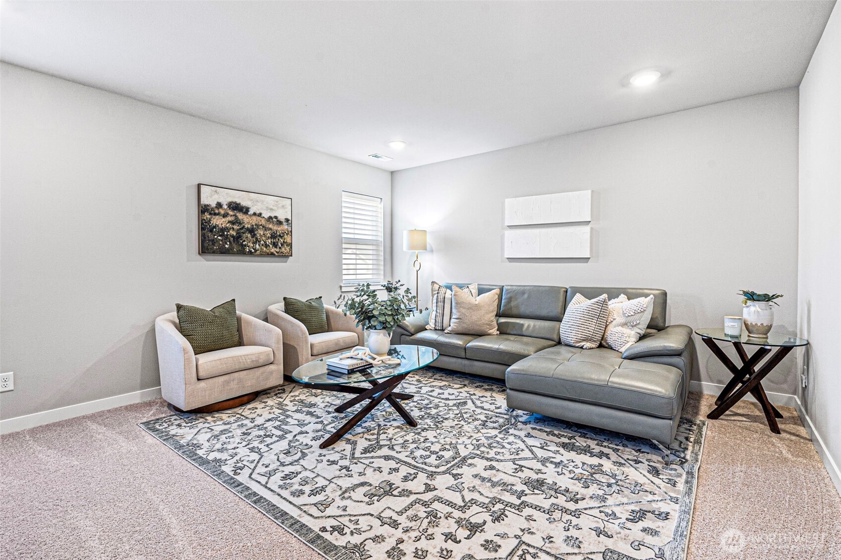 4526 Olympus Loop Gig Harbor, WA 98332 - Photo 26 of 38 a living room with furniture and a rug
