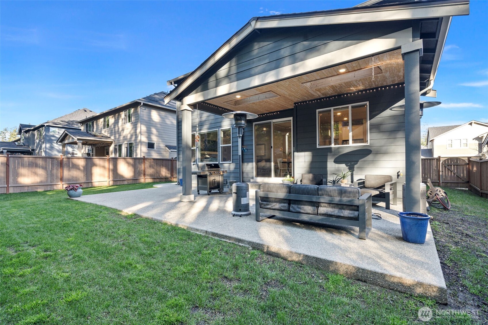 4526 Olympus Loop Gig Harbor, WA 98332 - Photo 29 of 38 a view of a house with backyard and sitting area