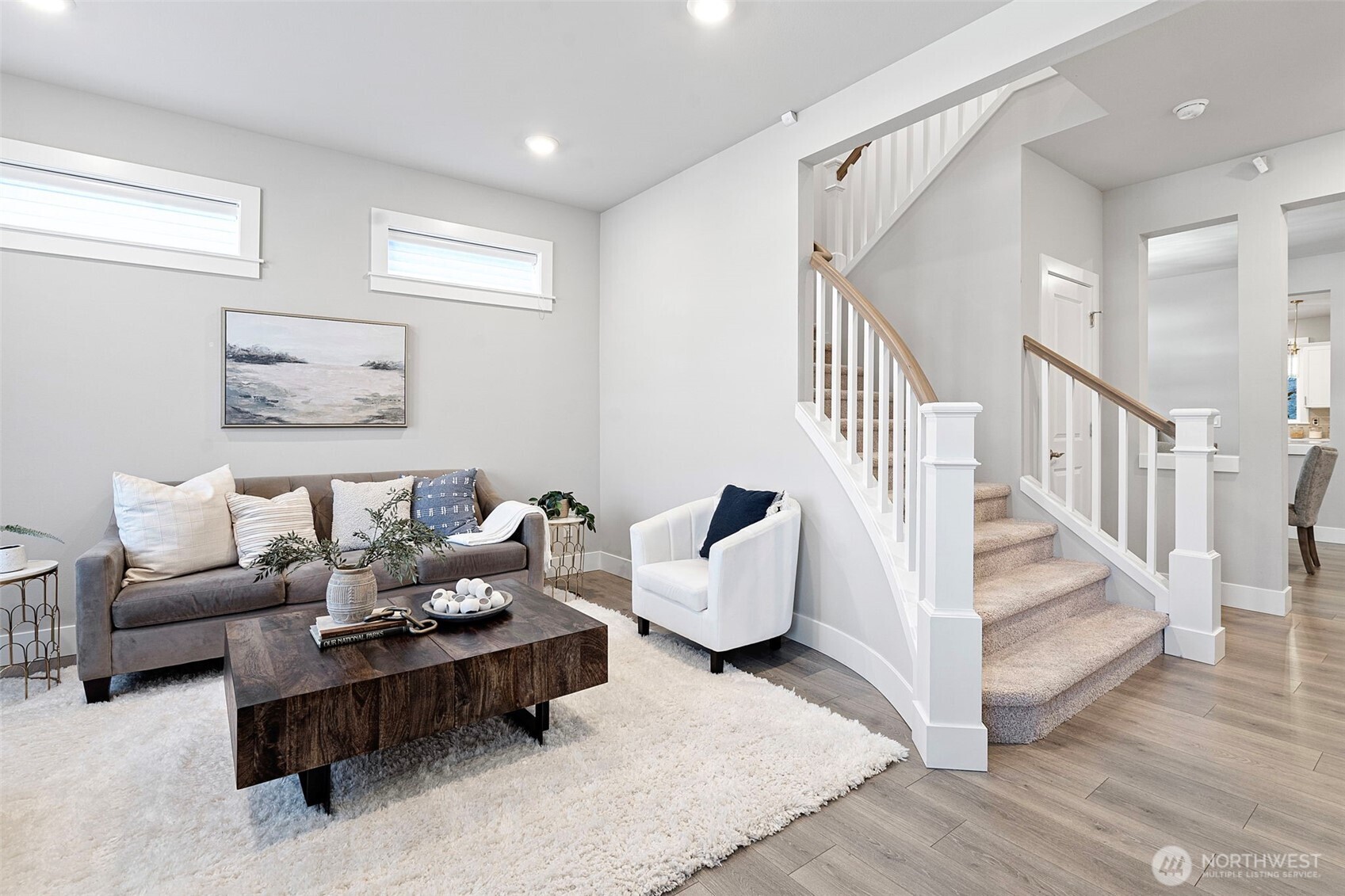 4526 Olympus Loop Gig Harbor, WA 98332 - Photo 3 of 38 a living room with furniture and stairs