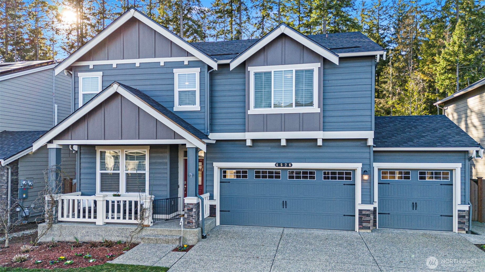 4526 Olympus Loop Gig Harbor, WA 98332 - Photo 32 of 38 a front view of a house with a porch