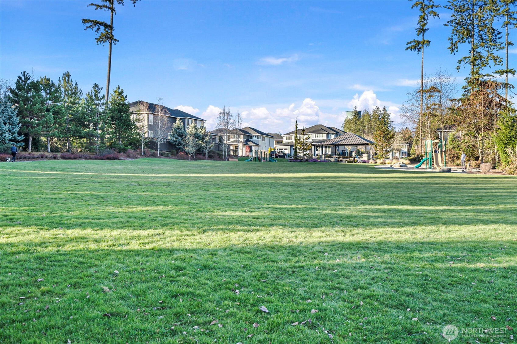 4526 Olympus Loop Gig Harbor, WA 98332 - Photo 36 of 38 a front view of a building with a garden