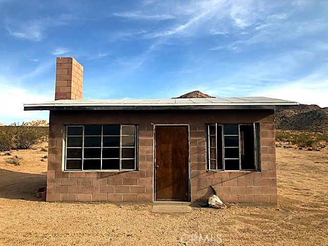 51050 Cholla Road Johnson Valley, CA 92285 - Photo 2 of 11 a view of front door of house