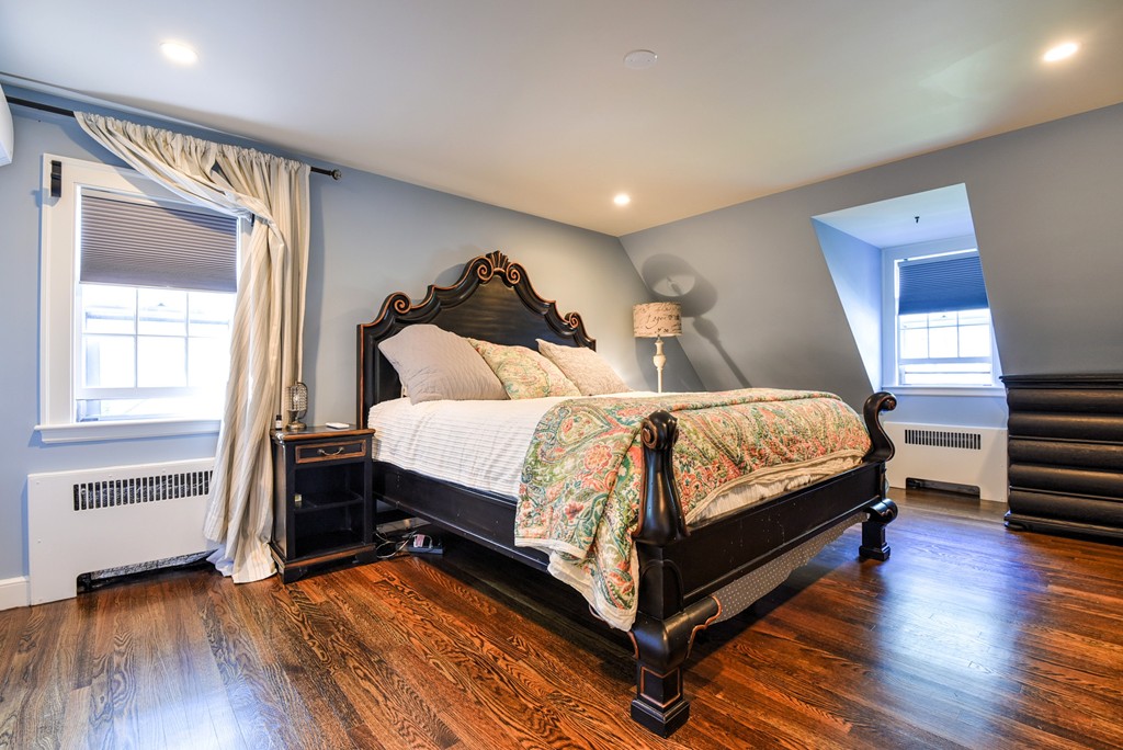 75 Clarke Road Needham, MA 02492 - Photo 10 of 19 a bedroom with a bed and a dresser