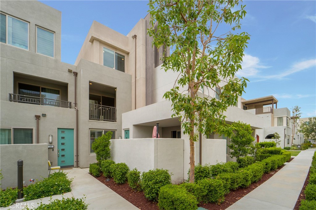 207 Magnet Irvine, CA 92618 - Photo 1 of 1 a front view of a house with a garden