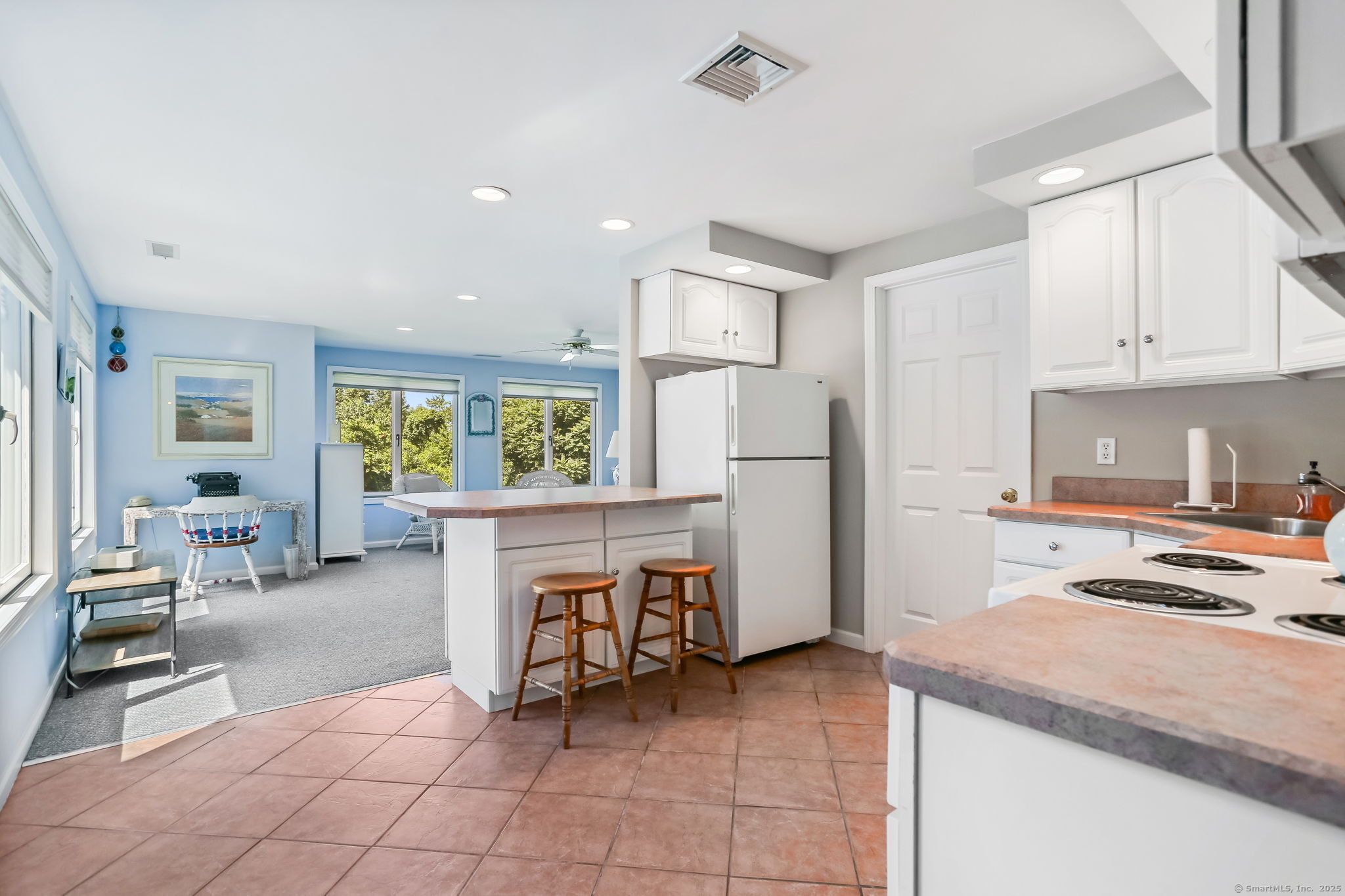 132 Merrimac Drive Trumbull, CT 06611 - Photo 32 of 40 Lower Level Kitchen & Living Room