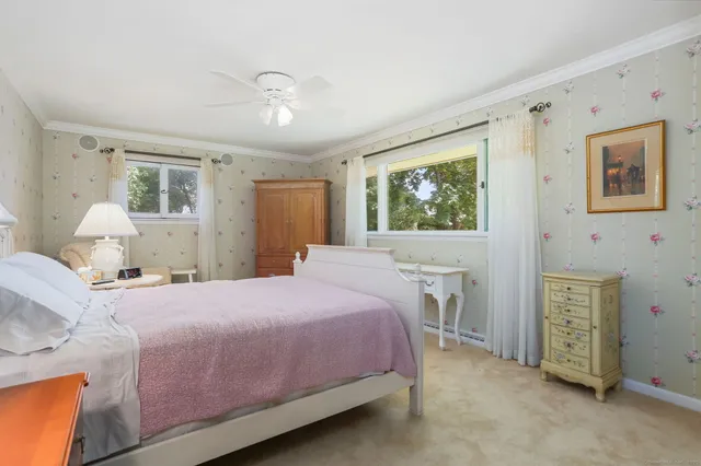 a bedroom with a bed and a cabinets